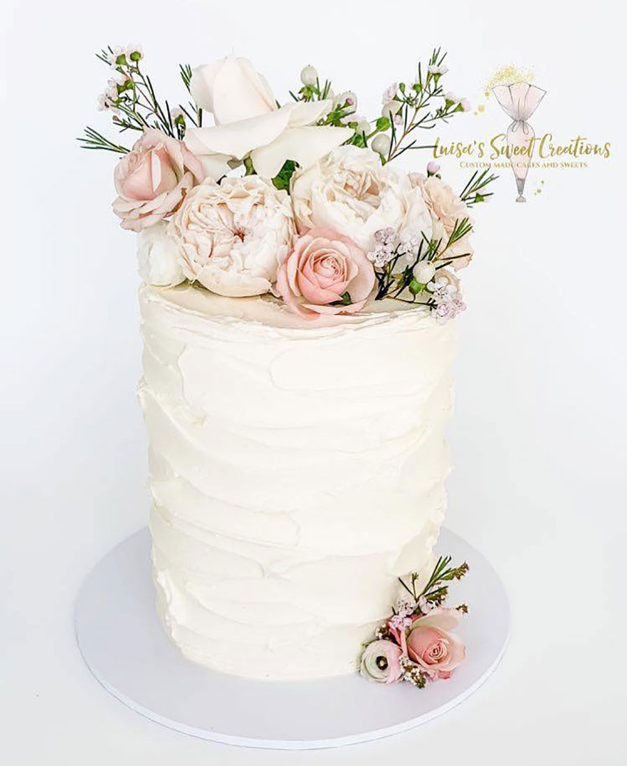Buttercream double barrel wedding cake with drips - - CakesDecor